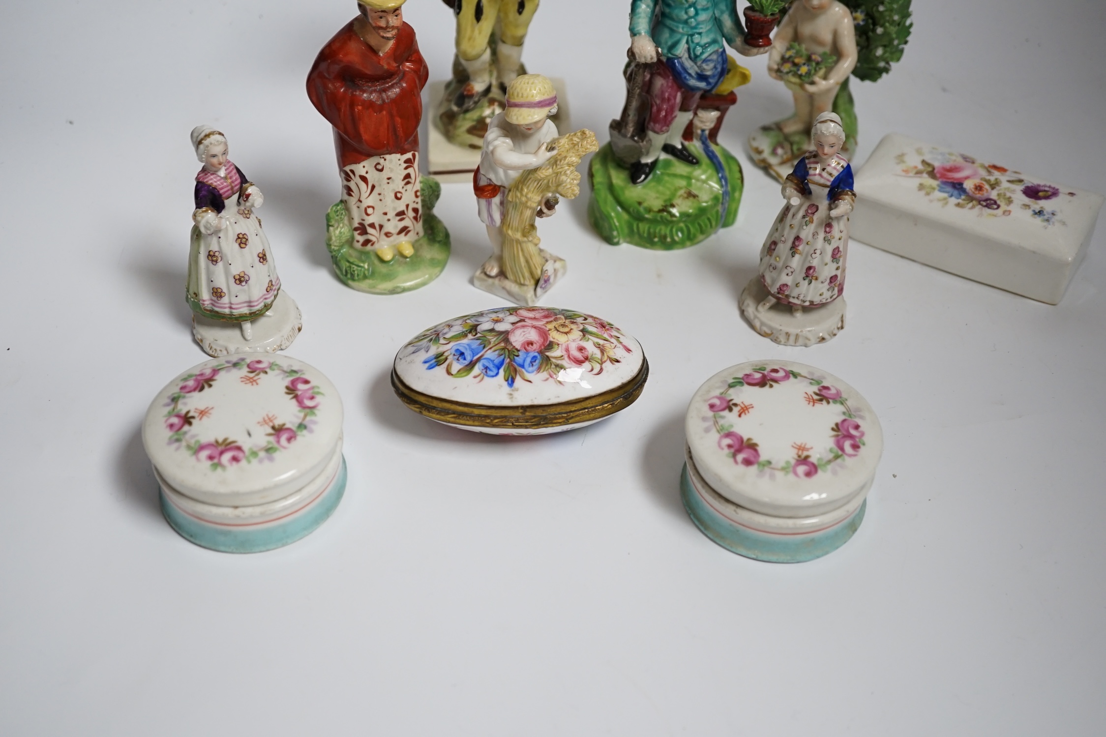 A group of early 19th century and later Staffordshire and other figures, Staffordshire enamel boxes etc, largest 17cm high